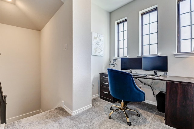 carpeted office with baseboards