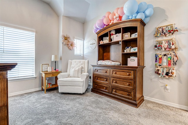 sitting room with carpet flooring and baseboards