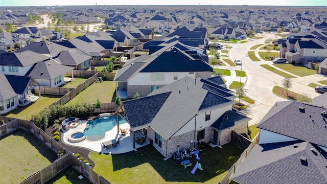 drone / aerial view with a residential view