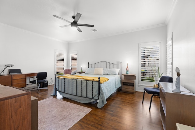 bedroom with dark wood-style floors, visible vents, crown molding, and a ceiling fan