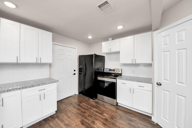 kitchen with electric range, visible vents, dark wood finished floors, white cabinetry, and black refrigerator with ice dispenser