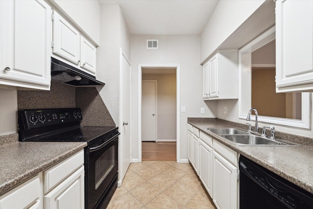 kitchen with visible vents, black appliances, under cabinet range hood, a sink, and white cabinets