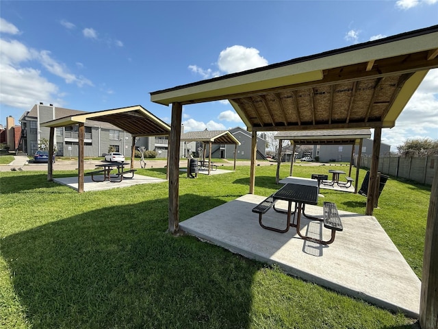 exterior space with a gazebo, a patio area, and fence