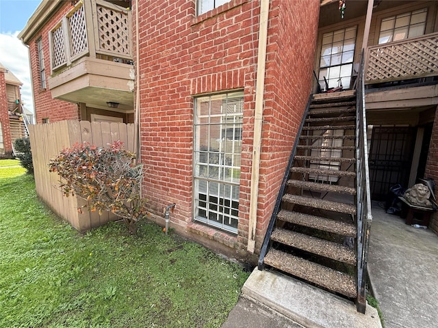 doorway to property with brick siding