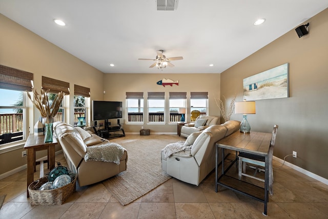 living room featuring visible vents, recessed lighting, a ceiling fan, and baseboards