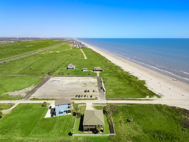 aerial view featuring a view of the beach and a water view