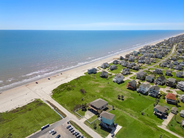 aerial view with a view of the beach and a water view