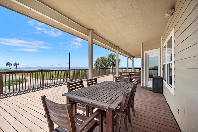 deck featuring outdoor dining area