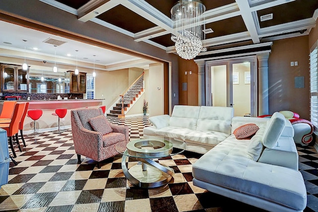 living area with visible vents, crown molding, stairs, tile patterned floors, and coffered ceiling