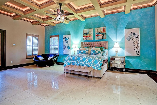 bedroom featuring baseboards, a high ceiling, beam ceiling, and tile patterned flooring