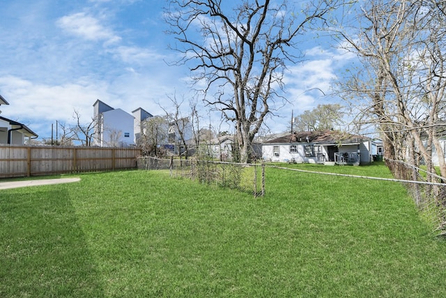 view of yard with a fenced backyard