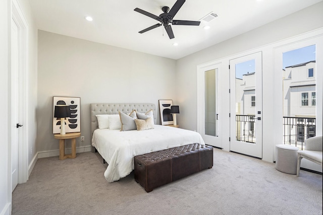 carpeted bedroom featuring recessed lighting, visible vents, multiple windows, and access to outside