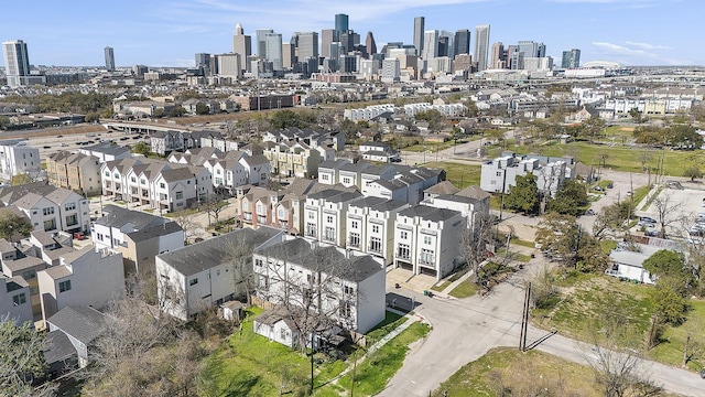 birds eye view of property featuring a city view