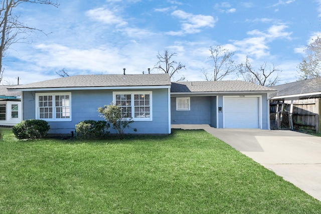 ranch-style house with fence, roof with shingles, an attached garage, a front lawn, and concrete driveway