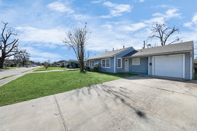 single story home with a front lawn, concrete driveway, and a garage