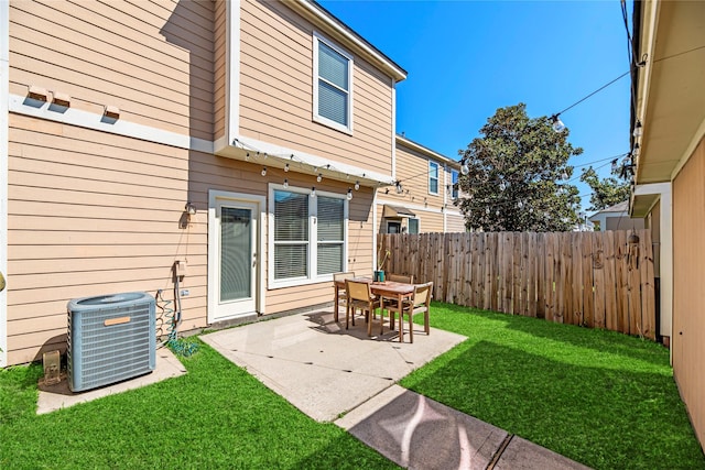 exterior space with a patio, cooling unit, and fence