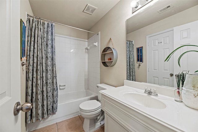 full bathroom with tile patterned floors, visible vents, toilet, and vanity