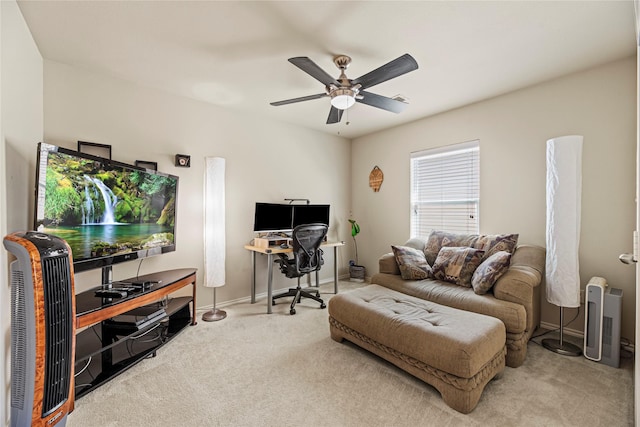 interior space featuring visible vents, a ceiling fan, and baseboards