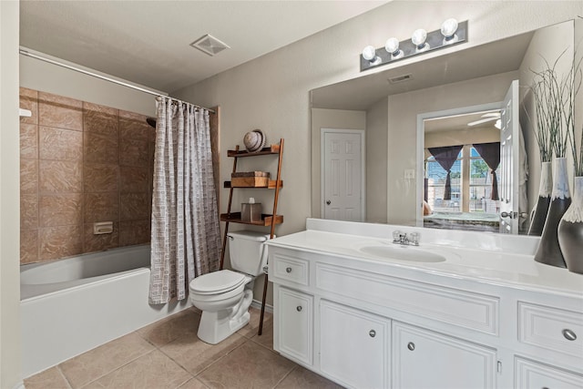 full bathroom with tile patterned flooring, visible vents, toilet, vanity, and shower / bathtub combination with curtain