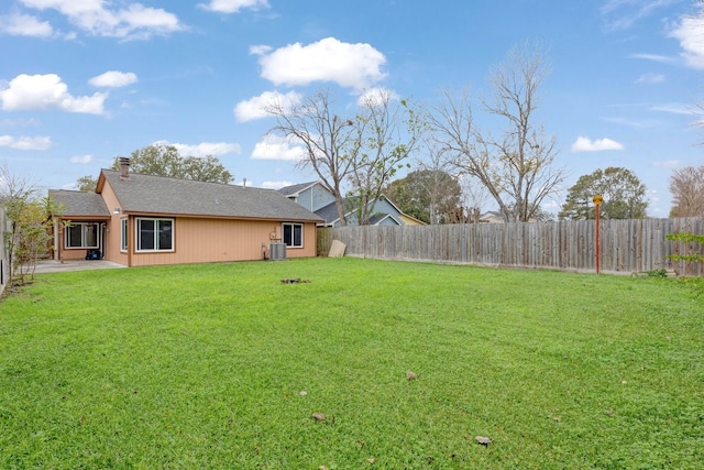 view of yard featuring a patio and a fenced backyard