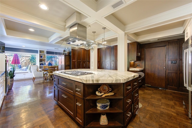 kitchen featuring visible vents, stainless steel gas cooktop, light countertops, island exhaust hood, and open shelves