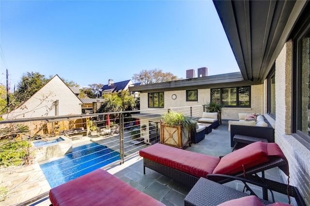 view of patio / terrace featuring an outdoor living space, a balcony, and central AC