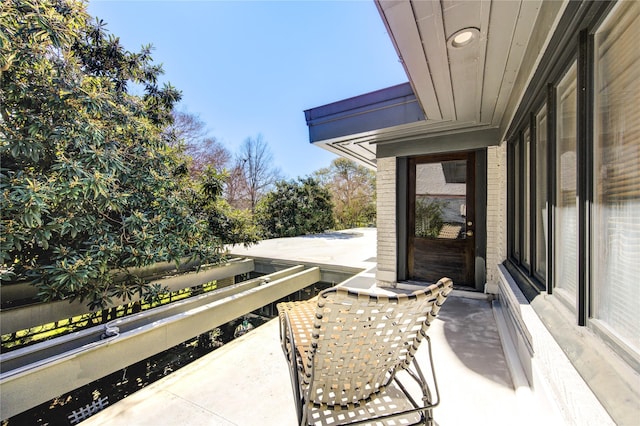 view of patio with a balcony