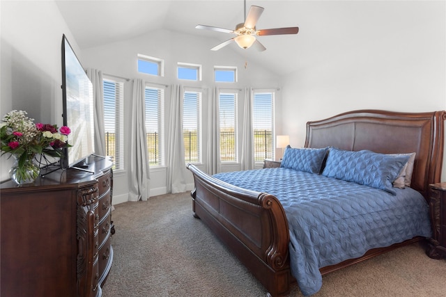 bedroom with ceiling fan, baseboards, lofted ceiling, and carpet floors