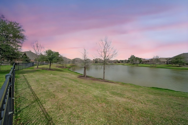 view of water feature featuring fence