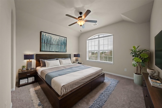 bedroom with visible vents, baseboards, vaulted ceiling, carpet floors, and a ceiling fan