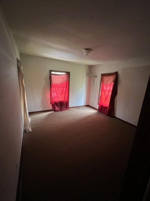 spare room featuring carpet flooring