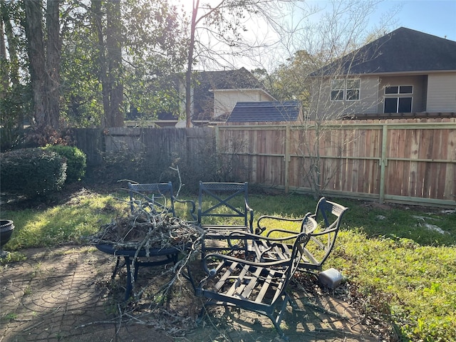 view of yard with a patio and fence