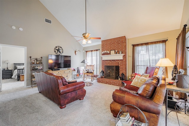 carpeted living room featuring a wealth of natural light, visible vents, a fireplace, and ceiling fan