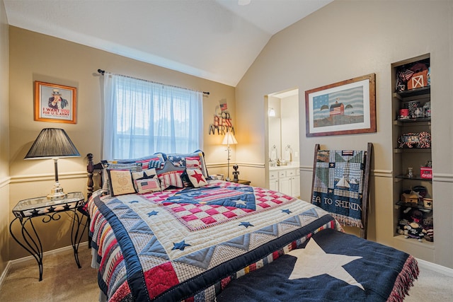 carpeted bedroom featuring connected bathroom, baseboards, and lofted ceiling