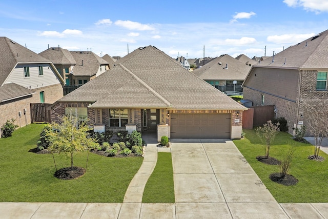 view of front of property featuring brick siding, roof with shingles, concrete driveway, and an attached garage