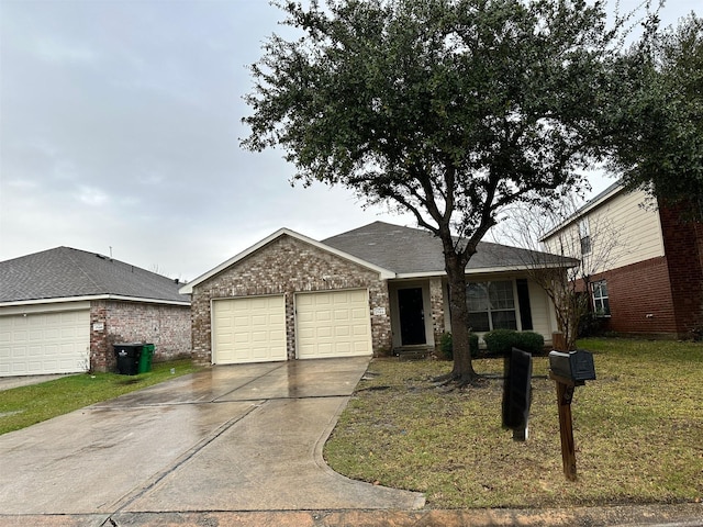 ranch-style house with brick siding, driveway, an attached garage, and a front yard