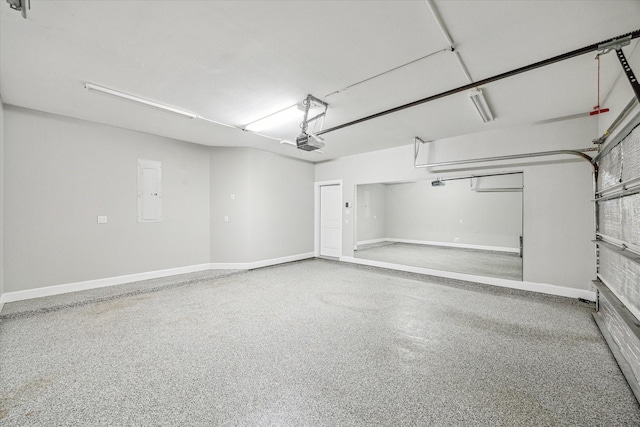 garage with electric panel, baseboards, and a garage door opener