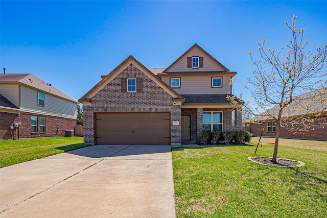 craftsman inspired home with brick siding, driveway, a front lawn, and a garage
