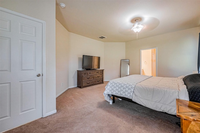 bedroom featuring light carpet, visible vents, and baseboards