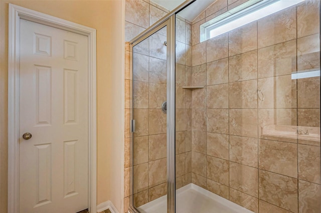 bathroom with a stall shower