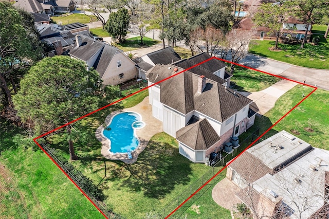 birds eye view of property with a residential view