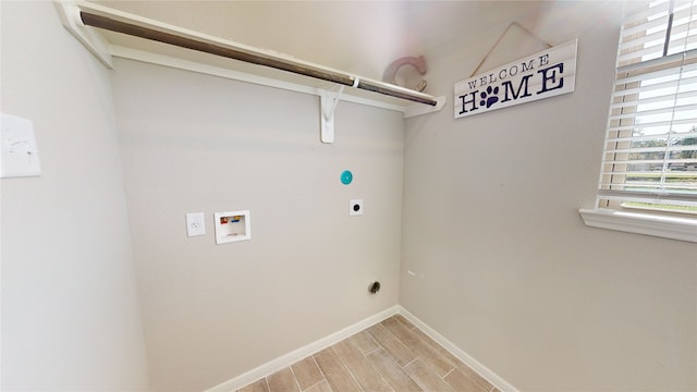 washroom with washer hookup, laundry area, baseboards, hookup for an electric dryer, and wood tiled floor