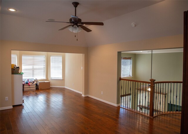 spare room with hardwood / wood-style flooring, recessed lighting, baseboards, ceiling fan, and vaulted ceiling