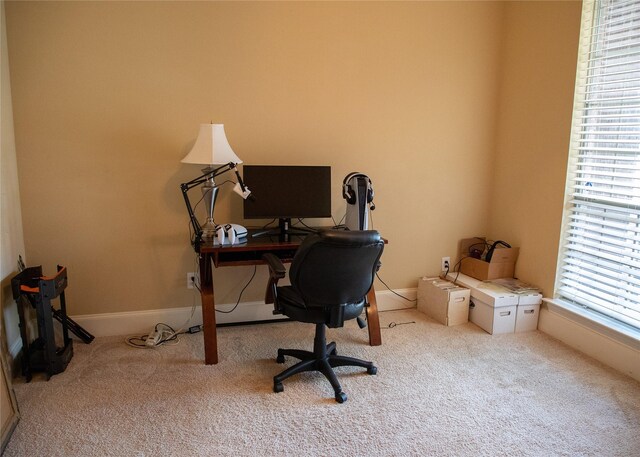 carpeted office with baseboards