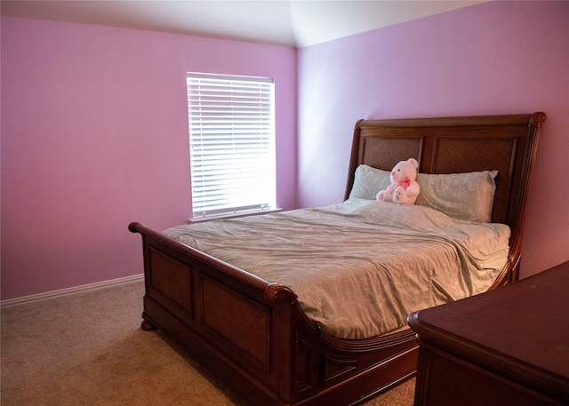 carpeted bedroom with baseboards