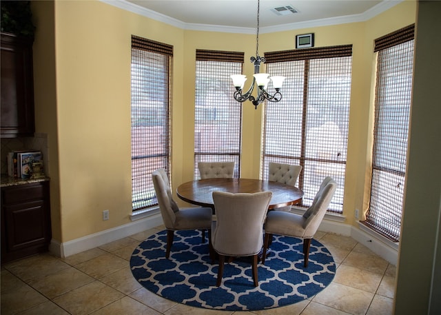 dining area featuring a chandelier, visible vents, light tile patterned flooring, and ornamental molding