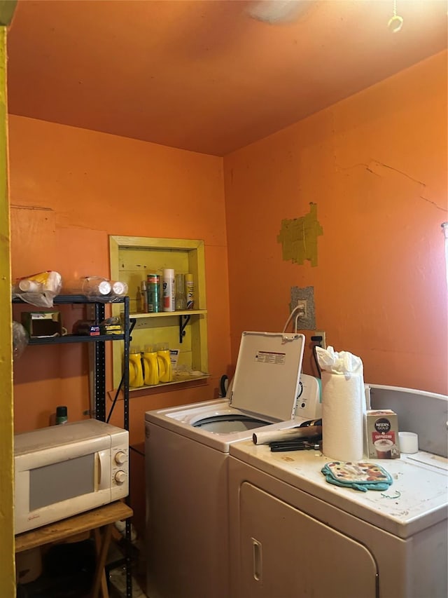 laundry area with laundry area and separate washer and dryer