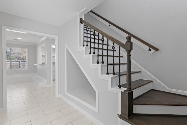 stairway with baseboards