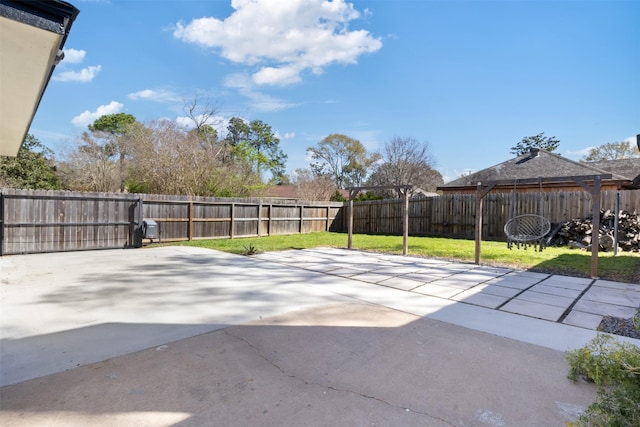 view of patio with a fenced backyard