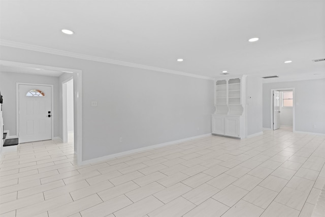 unfurnished room featuring crown molding, recessed lighting, baseboards, and visible vents